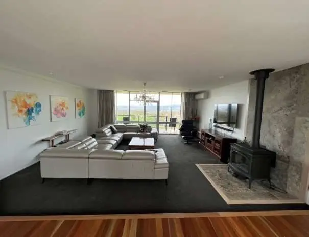 Upstairs Lounge Room with fireplace & TV